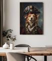 A captivating canvas portrait features a dog portrayed as a noble pirate captain. The dog wears a detailed pirate outfit, including a red coat with gold accents, a white ruffled cravat, and a leather strap across its chest. On its head sits an ornate black tricorn hat decorated with gold detailing and a skull emblem. The background depicts a stormy sky and a faint silhouette of a pirate ship on the ocean, adding a dramatic maritime atmosphere. Below the canvas, a wooden dining table with a white table runne