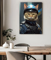 A striking canvas portrait features a cat dressed as a SWAT police officer. The feline wears a detailed police uniform, complete with a bulletproof vest, a navy-blue shirt, and a helmet with a police badge emblem. The cat's serious expression and sharp gaze exude authority and confidence. The background shows a dimly lit urban setting, enhancing the intense and professional theme of the artwork. The portrait hangs above a modern wooden dining table, decorated with a white table runner, potted plants, and sl